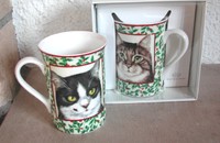 1 Tasse mit 2 Katzenköpfen